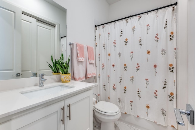 bathroom with toilet, shower / bath combination with curtain, and vanity