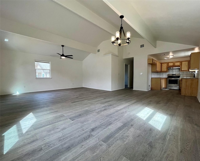 unfurnished living room with lofted ceiling with beams, ceiling fan with notable chandelier, dark wood-type flooring, a sink, and visible vents