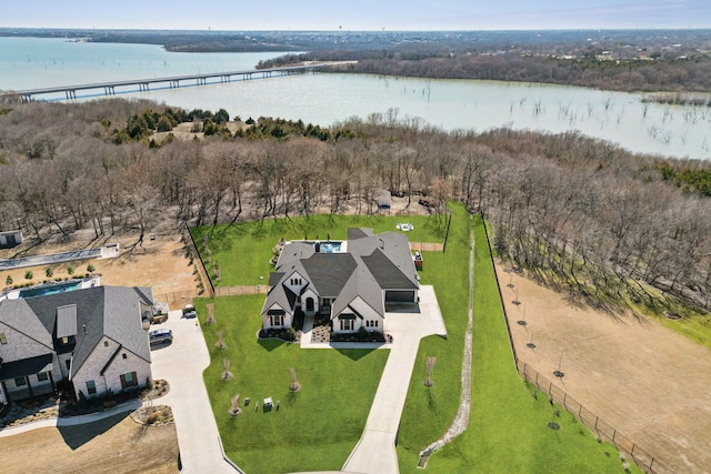 birds eye view of property featuring a water view