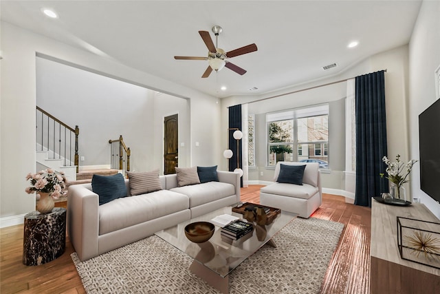 living area featuring visible vents, ceiling fan, recessed lighting, and light wood-style flooring