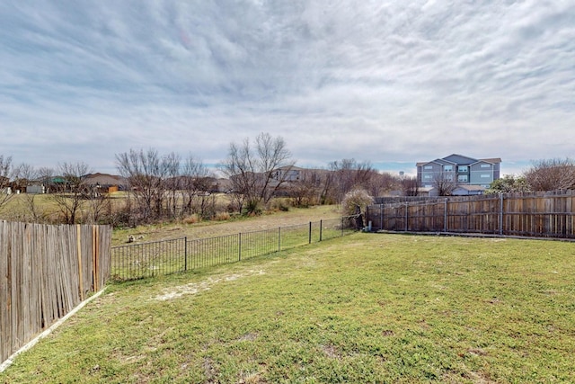 view of yard featuring a fenced backyard