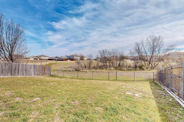 view of yard featuring a fenced backyard