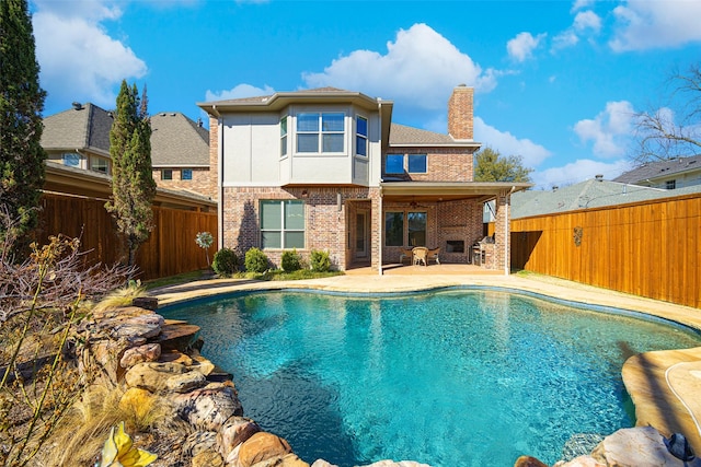 view of pool with a patio, a fenced backyard, and a fenced in pool