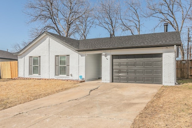 ranch-style house with a garage, brick siding, fence, concrete driveway, and roof with shingles