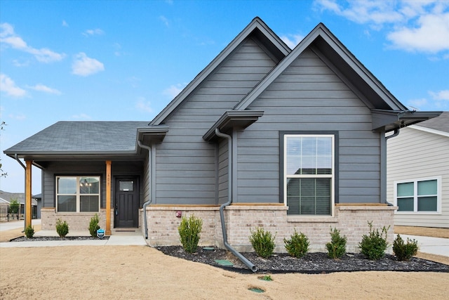 view of front facade featuring brick siding