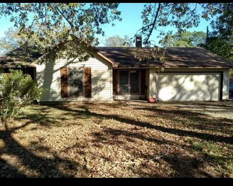 view of front of home with an attached garage