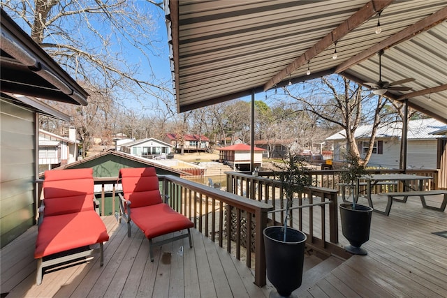 wooden deck with a residential view