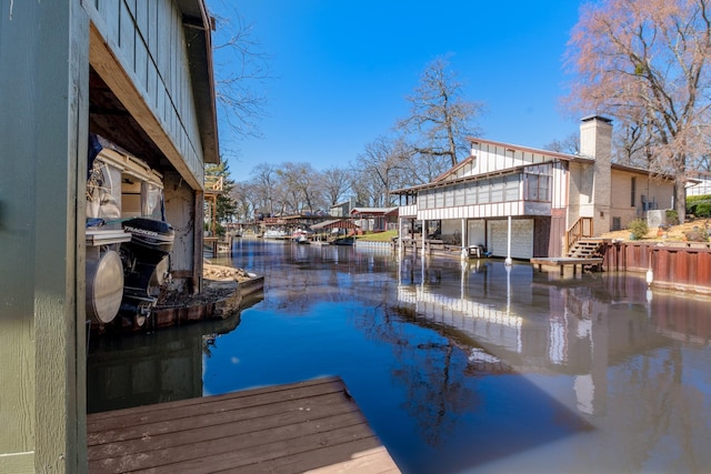 view of dock with a water view