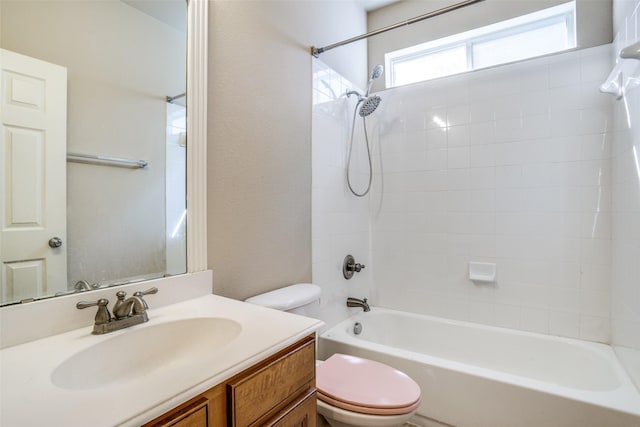 full bath with shower / bath combination, vanity, and toilet