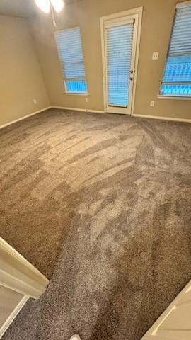 1730 Azalea Dr, Savannah, TX 76227 - carpeted empty room featuring a ceiling fan, baseboards, and vaulted ceiling
