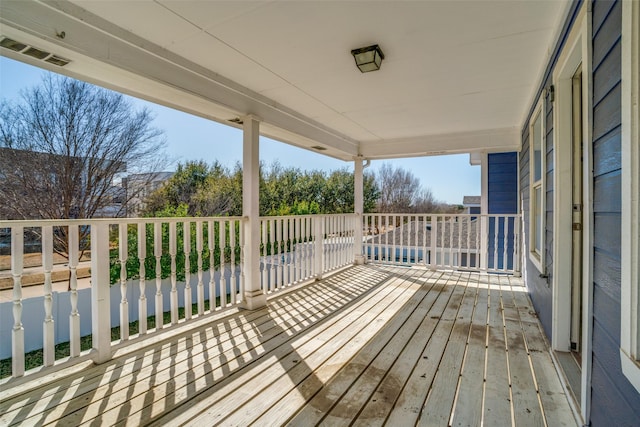 wooden terrace with visible vents