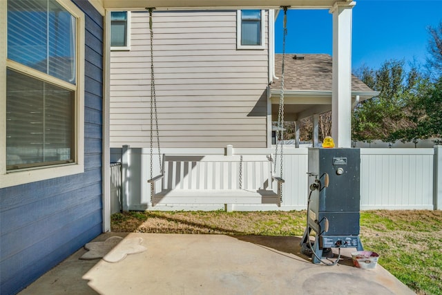 1730 Azalea Dr, Savannah, TX 76227 - view of exterior entry featuring a patio and roof with shingles