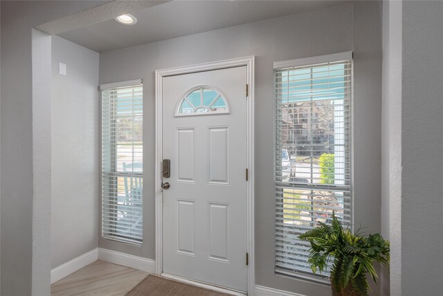 676 Harbor Dr, Azle, TX 76020 - foyer featuring baseboards and light wood finished floors