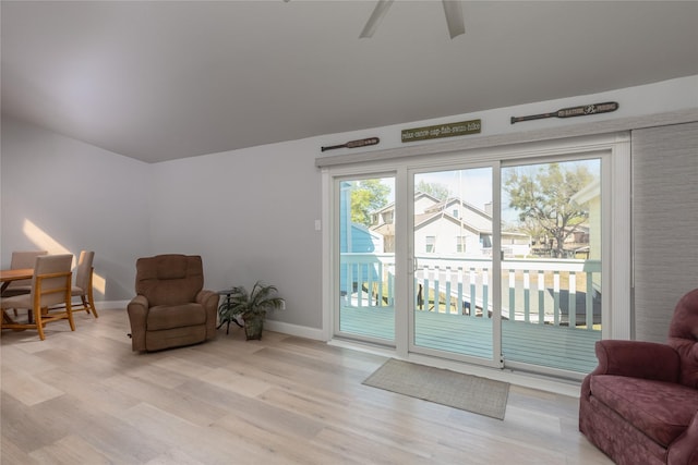 676 Harbor Dr, Azle, TX 76020 - living area with wood finished floors, plenty of natural light, baseboards, and ceiling fan
