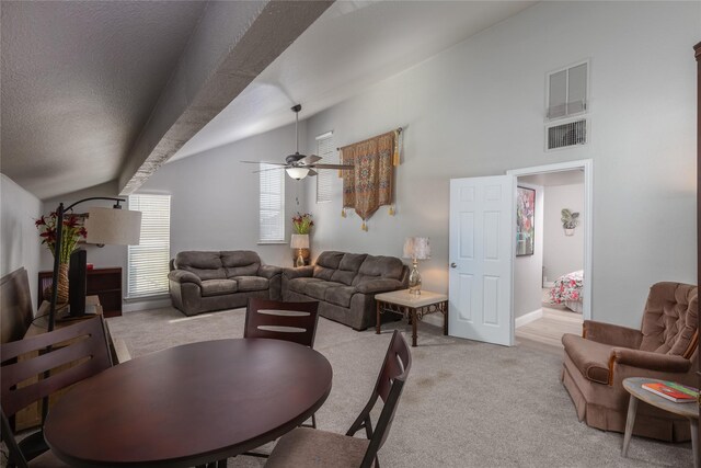 676 Harbor Dr, Azle, TX 76020 - living area featuring light carpet, a ceiling fan, and lofted ceiling