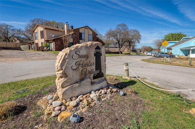 676 Harbor Dr, Azle, TX 76020 - view of asphalt street featuring traffic signs