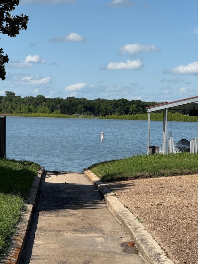 676 Harbor Dr, Azle, TX 76020 - water view featuring a boat ramp and a heavily wooded area