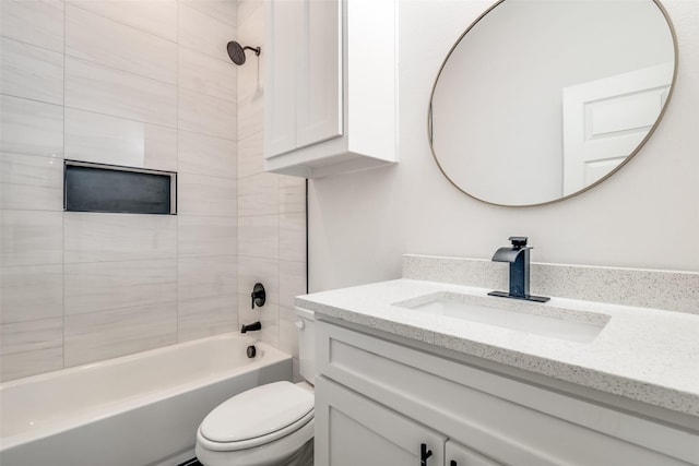 full bathroom with bathing tub / shower combination, vanity, and toilet