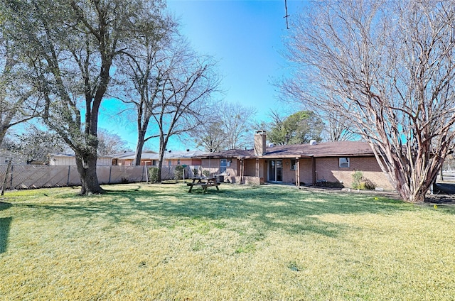 view of yard featuring fence