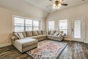 living area featuring a ceiling fan, lofted ceiling, baseboards, and wood finished floors