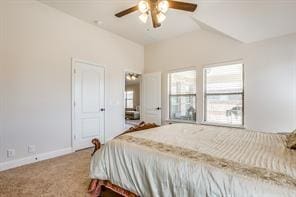 bedroom with lofted ceiling, carpet floors, ceiling fan, and baseboards