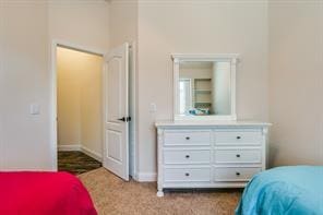 bedroom featuring baseboards