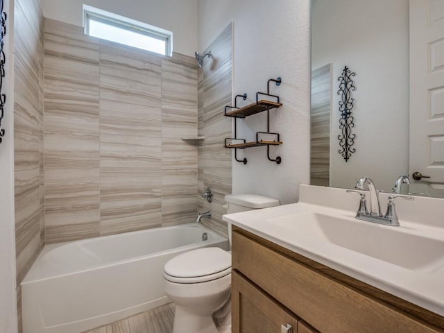 full bathroom featuring  shower combination, vanity, and toilet