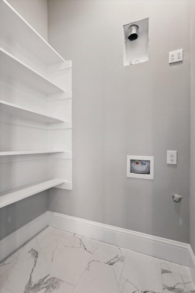laundry room featuring hookup for a washing machine, marble finish floor, laundry area, and baseboards