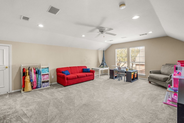 game room featuring carpet floors, baseboards, visible vents, and vaulted ceiling