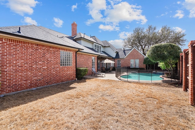 view of pool featuring a patio, a fenced backyard, and a fenced in pool