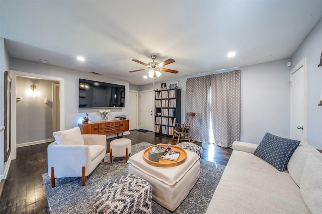 living room featuring dark wood-type flooring, recessed lighting, baseboards, and a ceiling fan