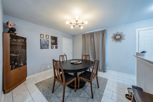 1216 Fuller Dr, Dallas, TX 75218 - dining area with baseboards and an inviting chandelier