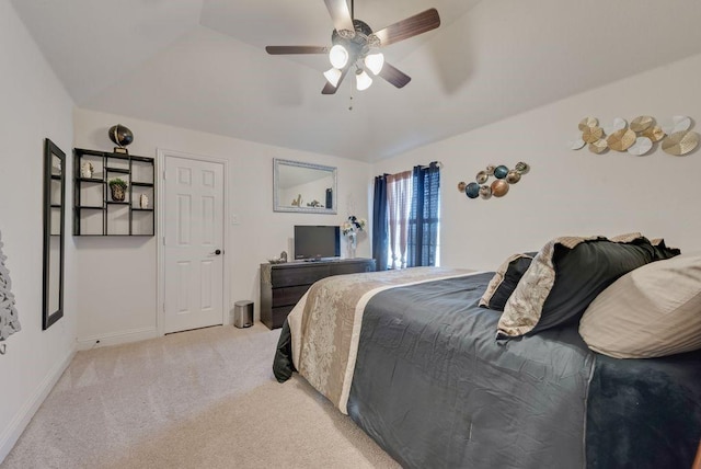 bedroom featuring light carpet, ceiling fan, and baseboards