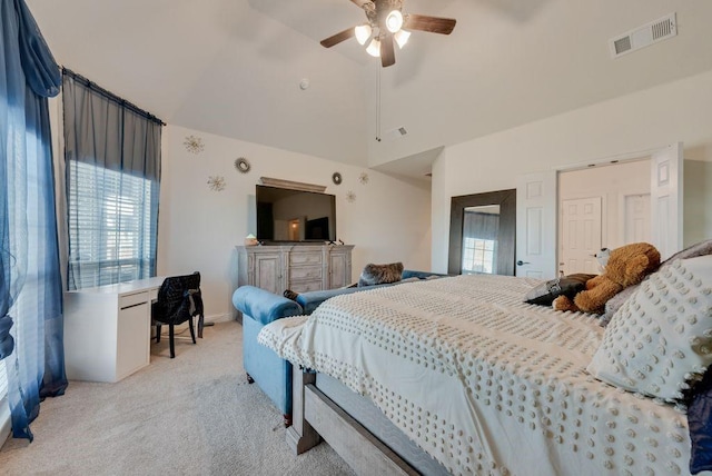 bedroom with ceiling fan, high vaulted ceiling, visible vents, and light colored carpet