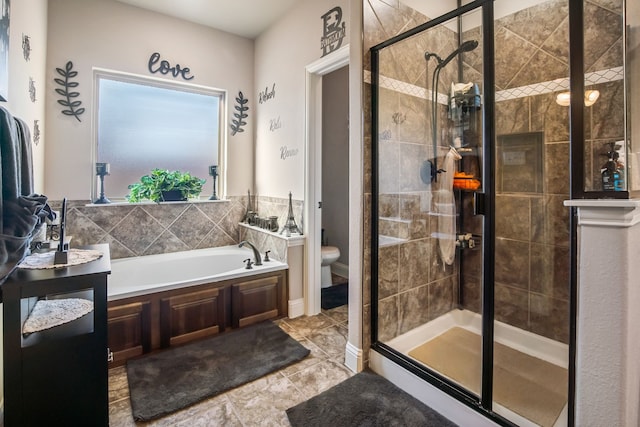 bathroom featuring a garden tub, tile patterned flooring, a shower stall, and toilet