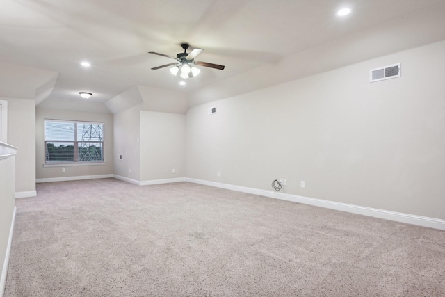 carpeted spare room featuring baseboards, visible vents, a ceiling fan, and recessed lighting