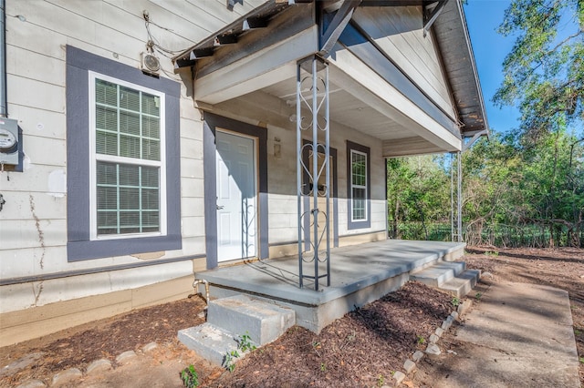 doorway to property with covered porch