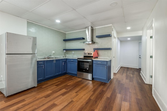 kitchen featuring blue cabinetry, open shelves, light countertops, appliances with stainless steel finishes, and a sink