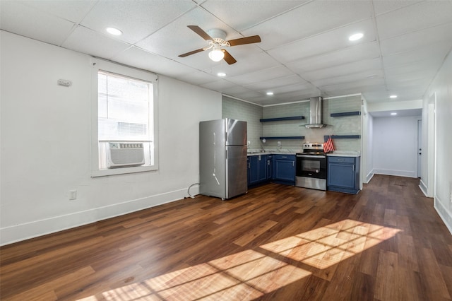 kitchen with cooling unit, blue cabinets, appliances with stainless steel finishes, wall chimney exhaust hood, and open shelves