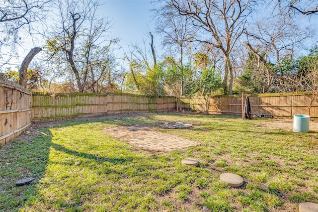 view of yard featuring a fenced backyard