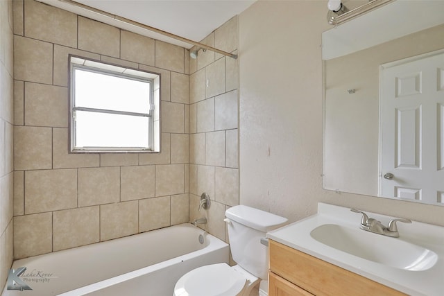 full bath featuring vanity, toilet, and shower / bathtub combination