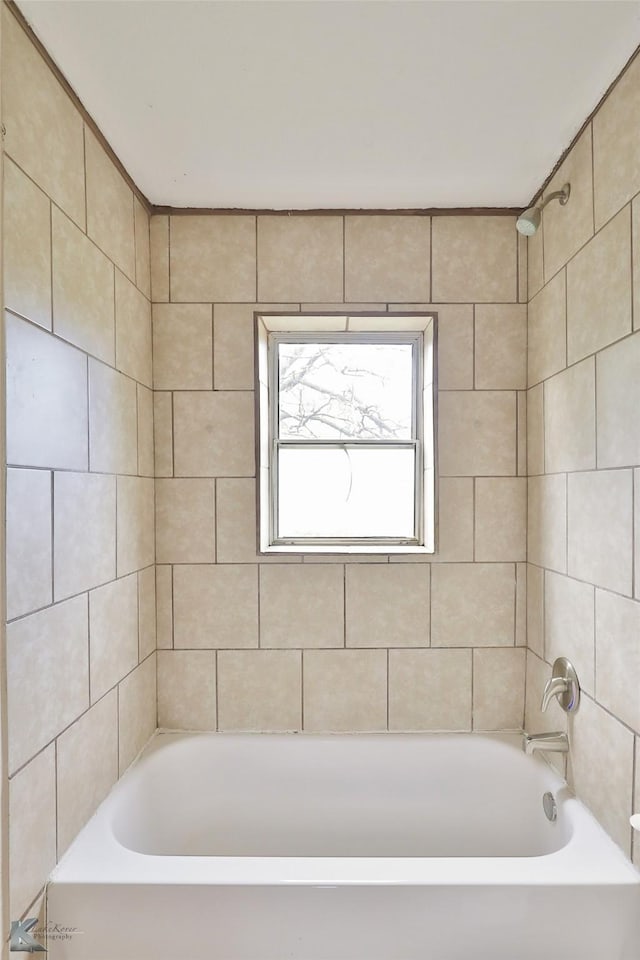 full bath featuring shower / washtub combination