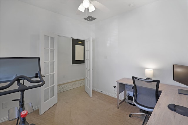 home office featuring french doors, visible vents, carpet flooring, ceiling fan, and baseboards