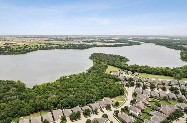 aerial view with a water view and a residential view