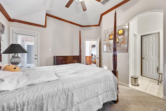 tiled bedroom featuring carpet floors, crown molding, lofted ceiling, visible vents, and ceiling fan