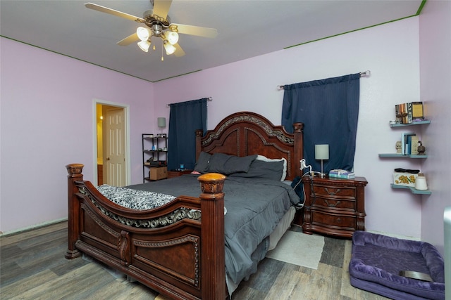 bedroom featuring a ceiling fan and wood finished floors