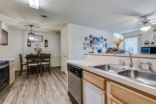 kitchen with visible vents, stainless steel dishwasher, light wood-style floors, a sink, and range with electric stovetop