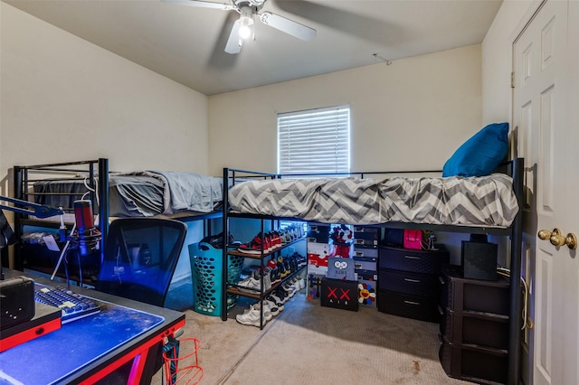 bedroom with carpet floors and a ceiling fan