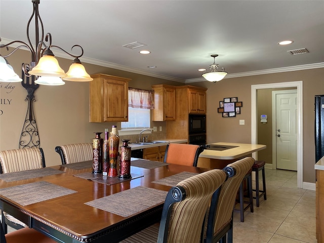 dining space with light tile patterned flooring, recessed lighting, baseboards, and ornamental molding