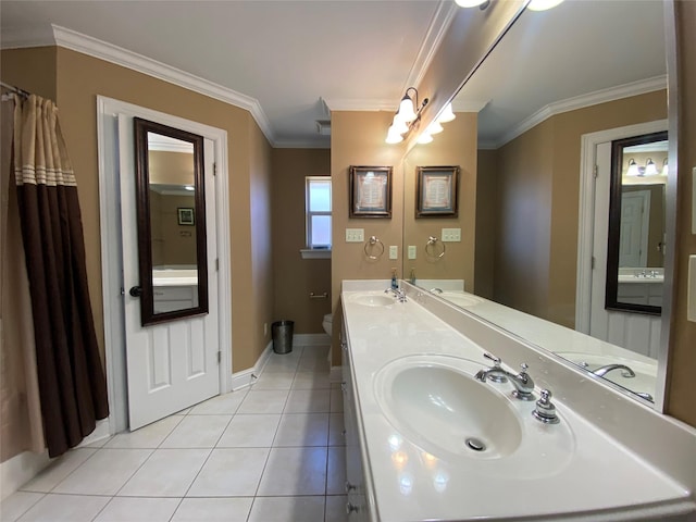 full bathroom with a sink, ornamental molding, and tile patterned flooring